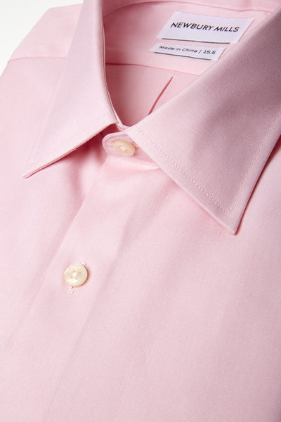 Solid Peach shirt folded with close up of fabric