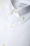 White Oxford Button Down shirt folded with closeup of fabric