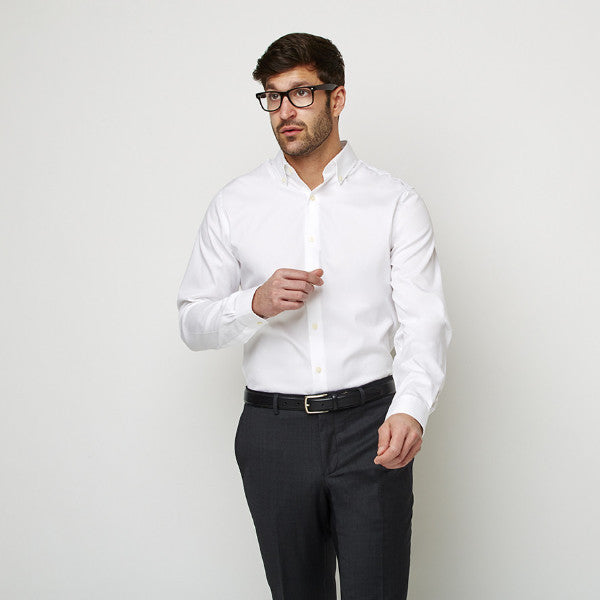 White Oxford Button Down shirt worn formally tucked in with glasses